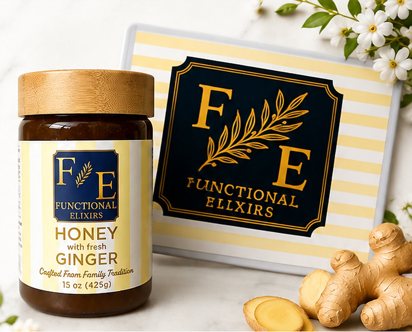 Functional Elixirs Honey with Fresh Ginger jar beside the F·E plaque, fresh ginger root and white blossom on marble